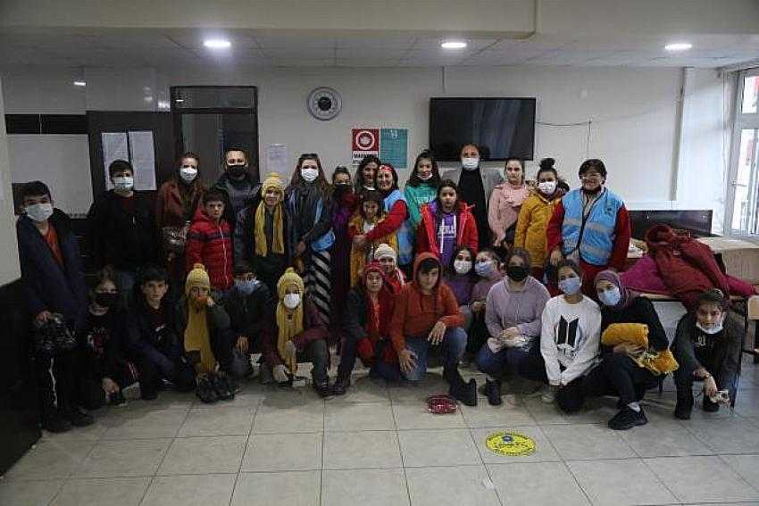 Sel felaketinden etkilenen çocuklara gurbetçi kadınlardan giyecek yardımı